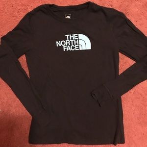 Mint blue north face logo on black long sleeve
